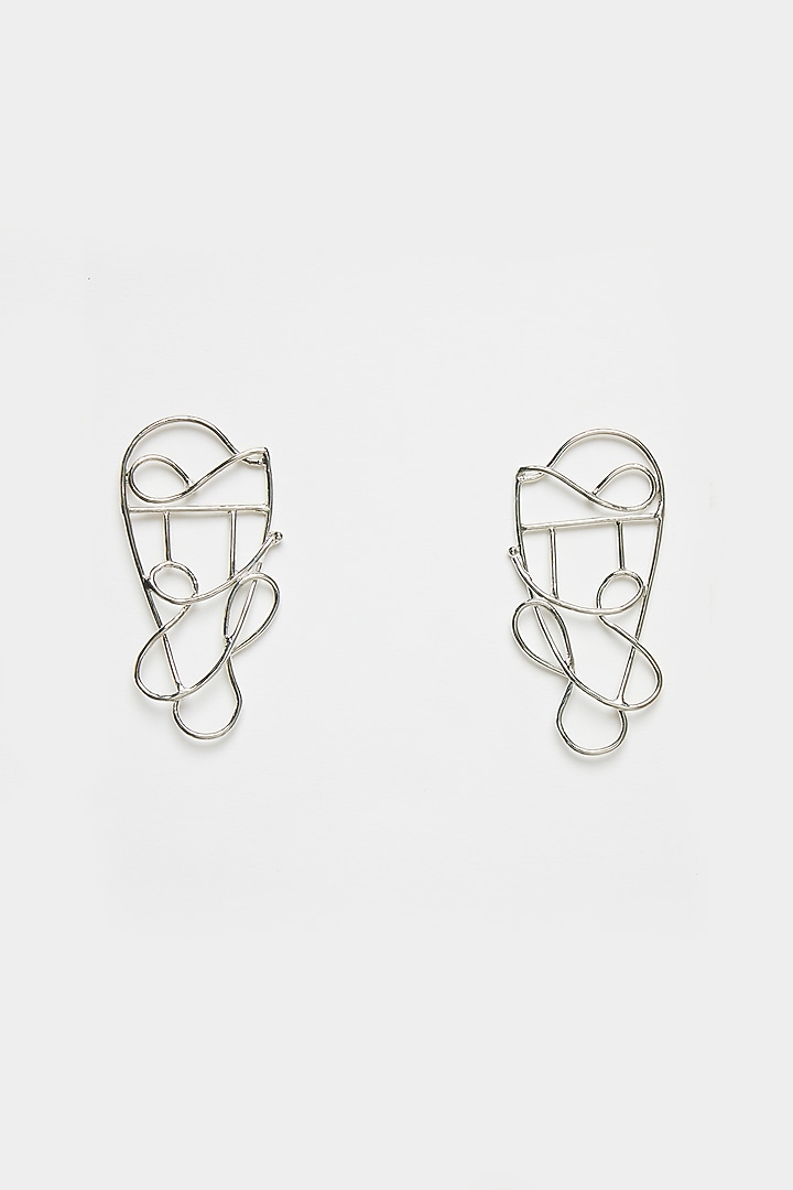 Silver Plated Metal Twisted Earrings by Valliyan By Nitya Arora at Pernia's Pop Up Shop