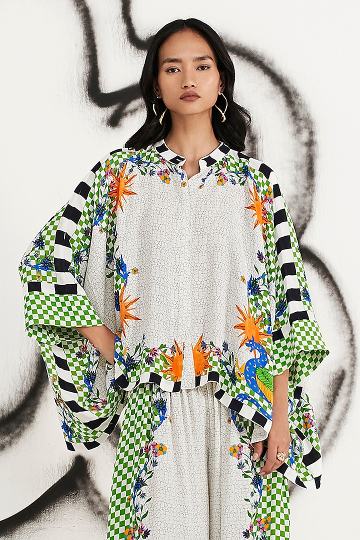 Ivory Double Georgette Printed Cape Blouse by Verb by Pallavi Singhee at Pernia's Pop Up Shop