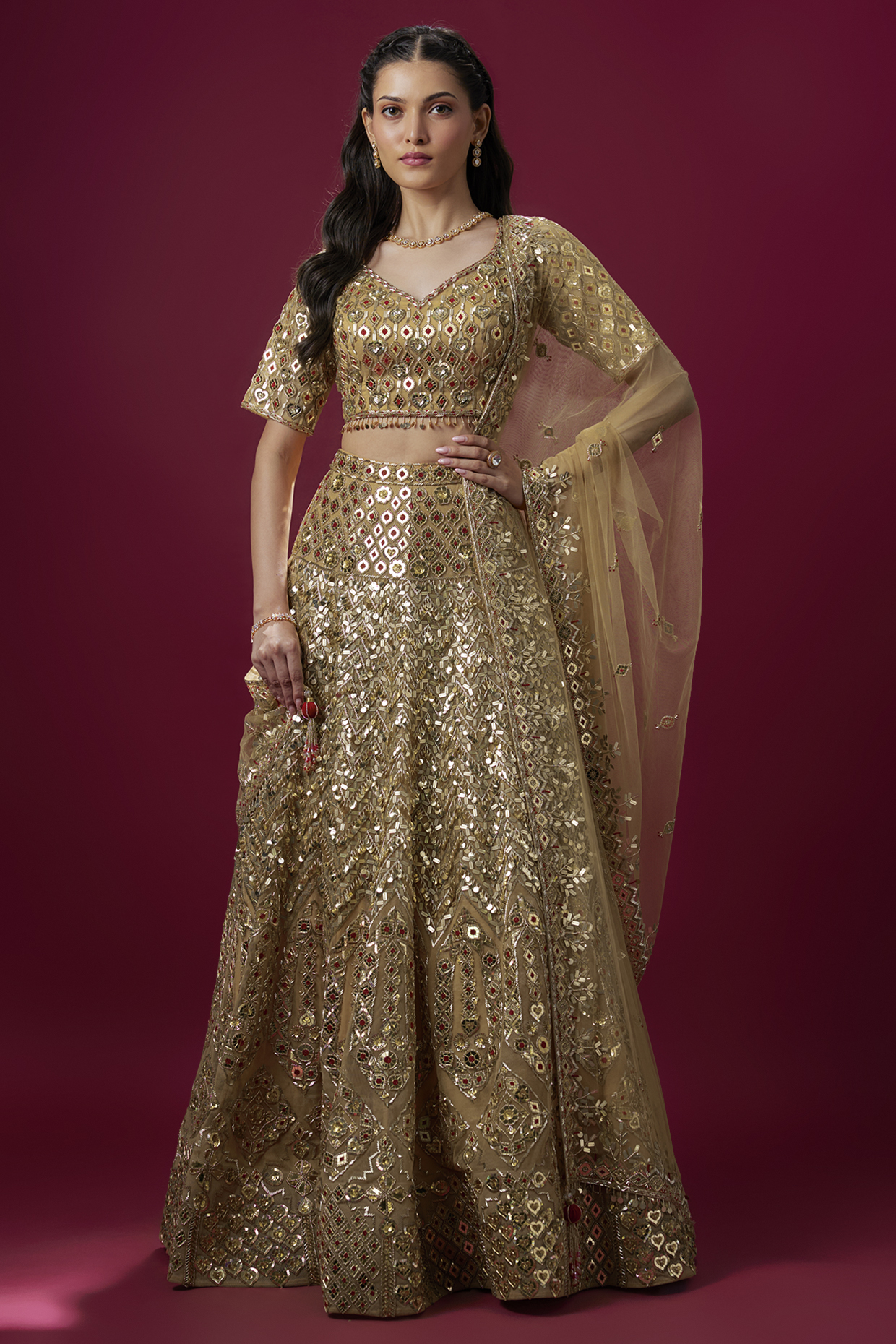 Gold Net Zari Embroidered Bridal Lehenga Set by V. Bridals at Pernia's Pop Up Shop