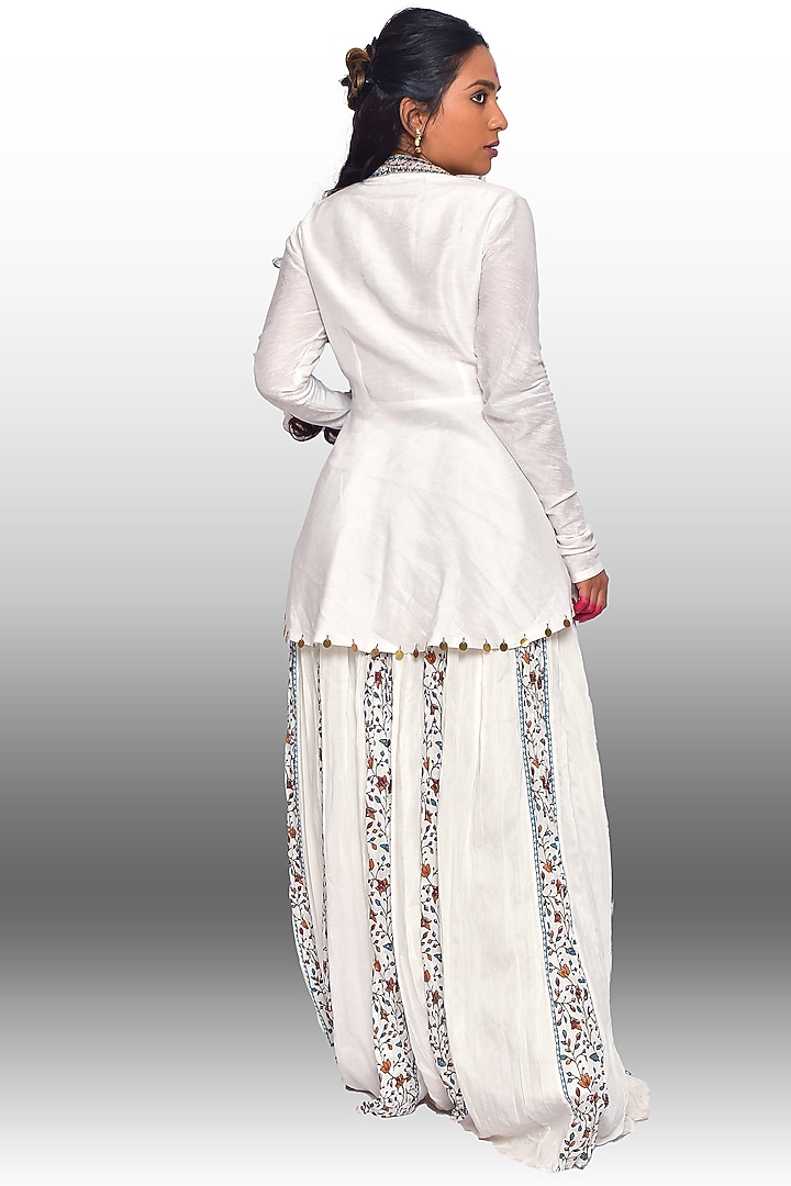 White Hand Embroidered Peplum Kurta Set by Vaibhavi & Sejal at Pernia's Pop Up Shop
