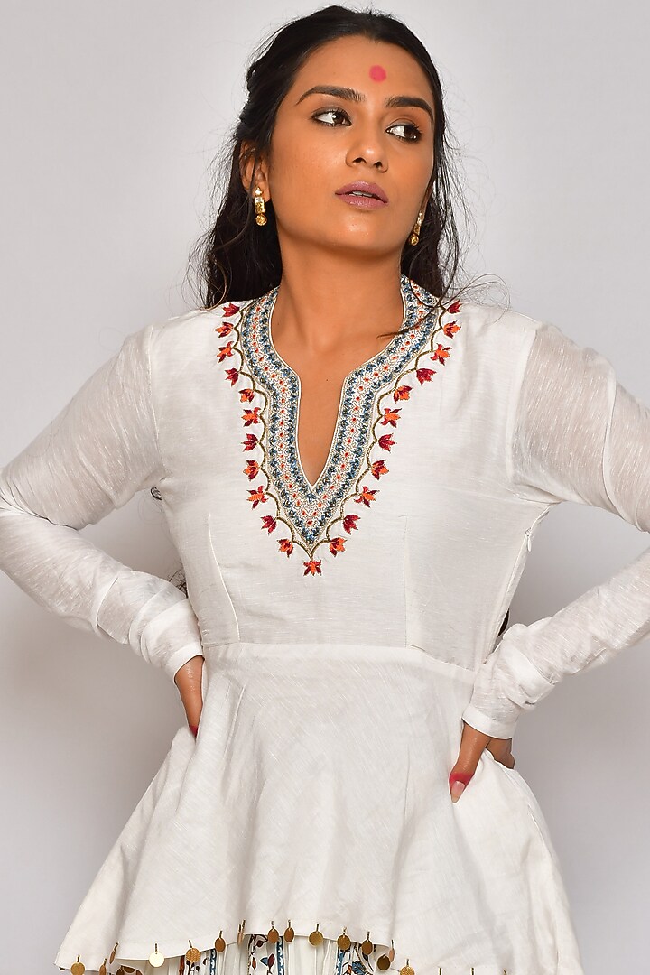 White Hand Embroidered Peplum Kurta Set by Vaibhavi & Sejal at Pernia's Pop Up Shop