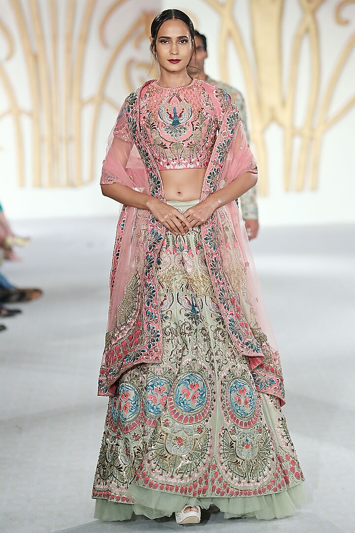 Green and pink embroidered lehenga set available only at Pernia's Pop Up Shop.
