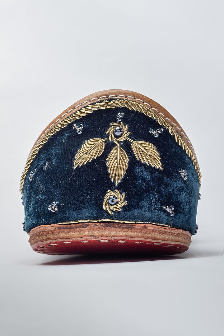 Teal blue embroidered zardozi work and pearl juttis available only at Pernia's Pop Up Shop.