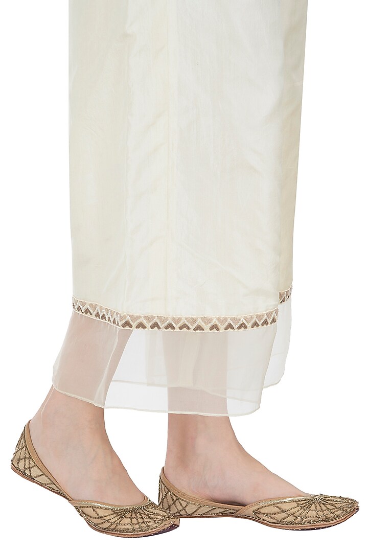 Golden zardozi and kathdana embroidered juttis available only at Pernia's Pop Up Shop.