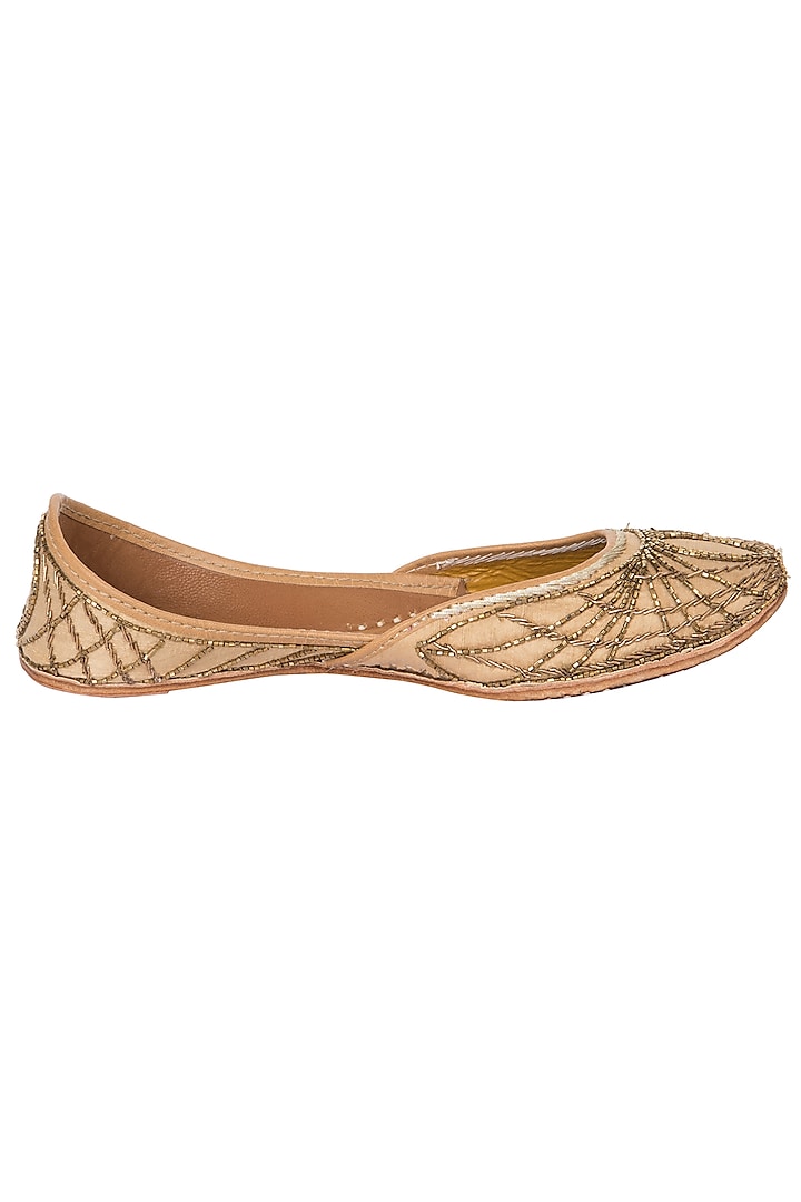 Golden zardozi and kathdana embroidered juttis available only at Pernia's Pop Up Shop.