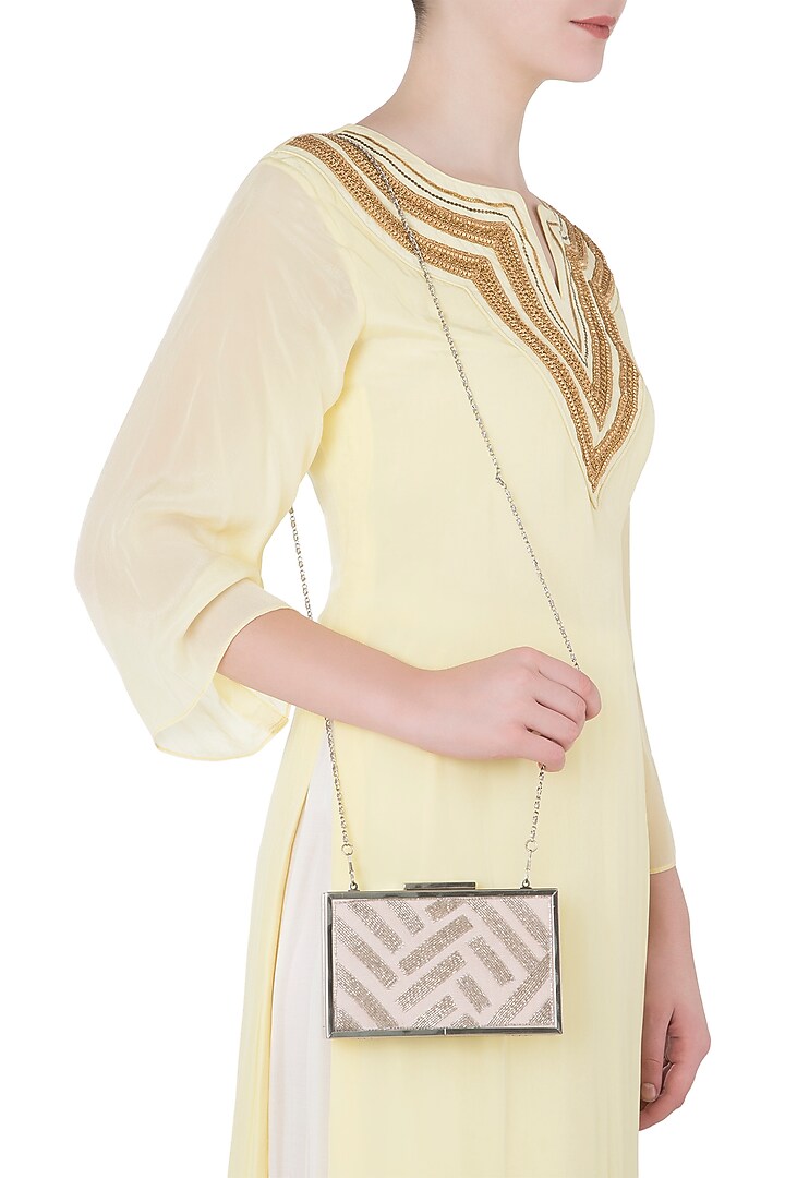 Pink silver cutdana embroidered clutch available only at Pernia's Pop Up Shop.