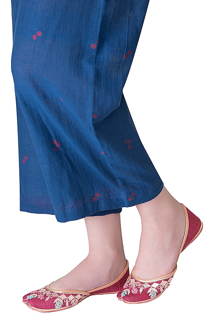 Carmine red embroidered juttis available only at Pernia's Pop Up Shop.