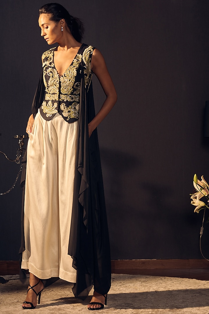 Black Embroidered Draped Jacket With Ivory Trousers by Varun Bahl