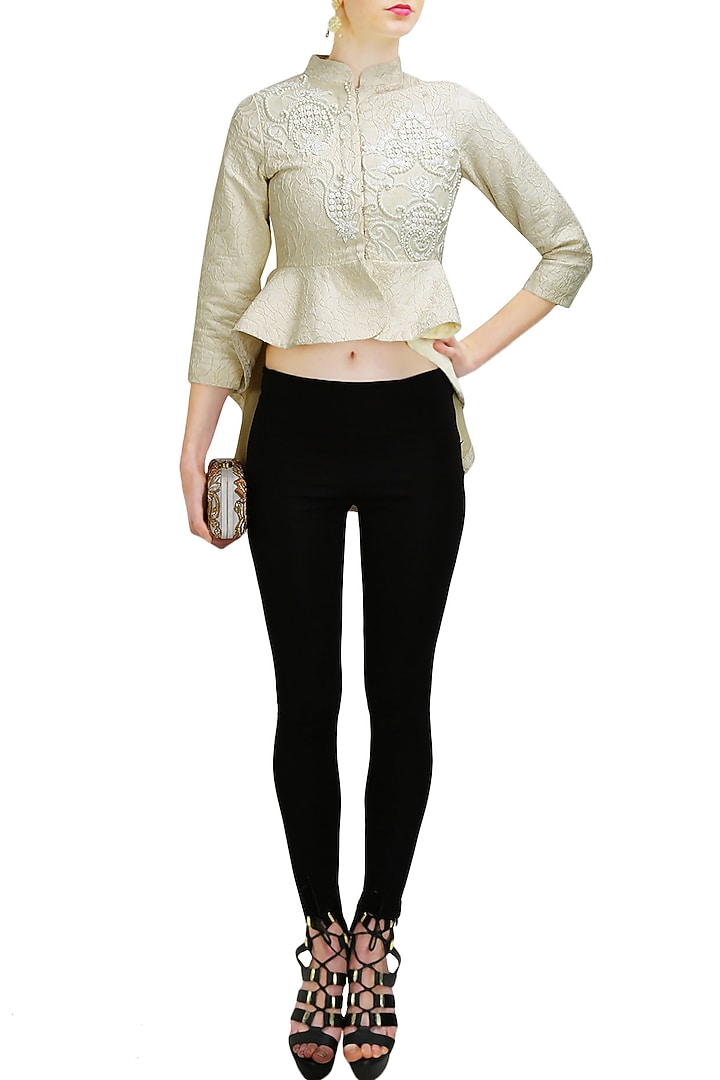 Ivory embroidered asymmetrical peplum top available only at Pernia's Pop Up Shop.