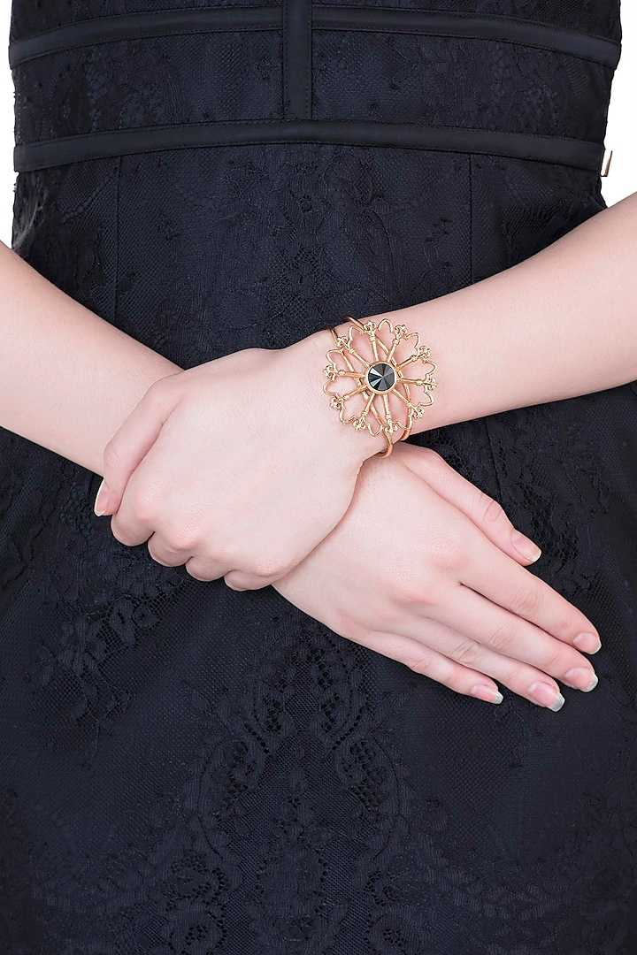 Rose gold plated stone floral cuff by Valliyan by Nitya Arora