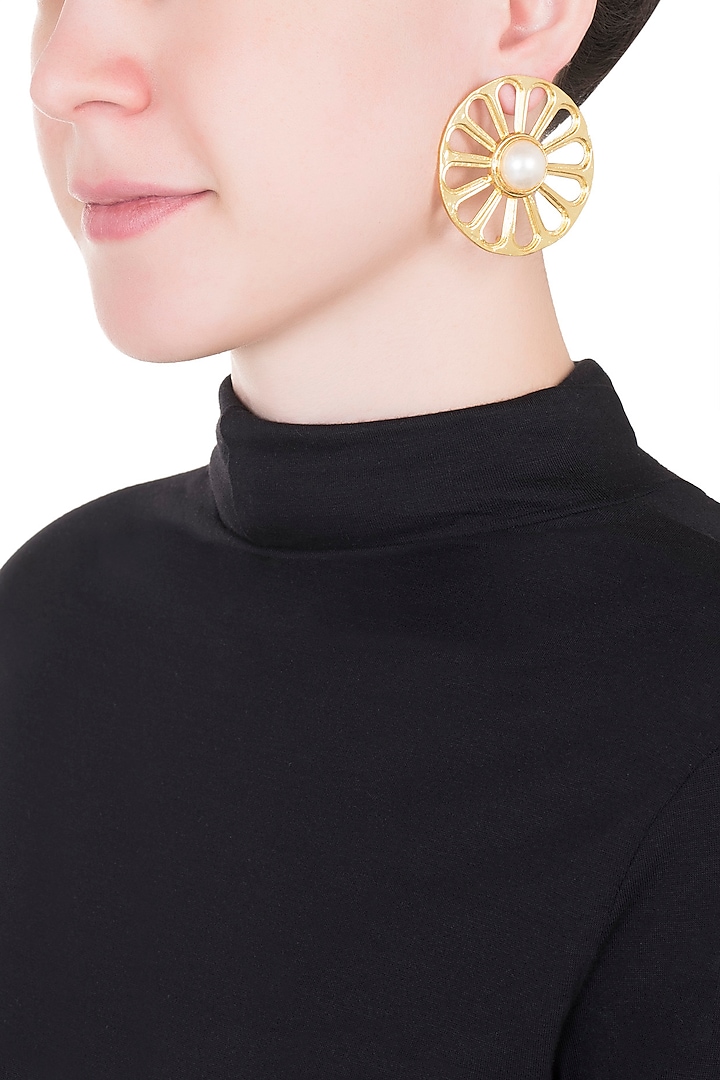 Gold plated wheel earrings by Valliyan by Nitya Arora