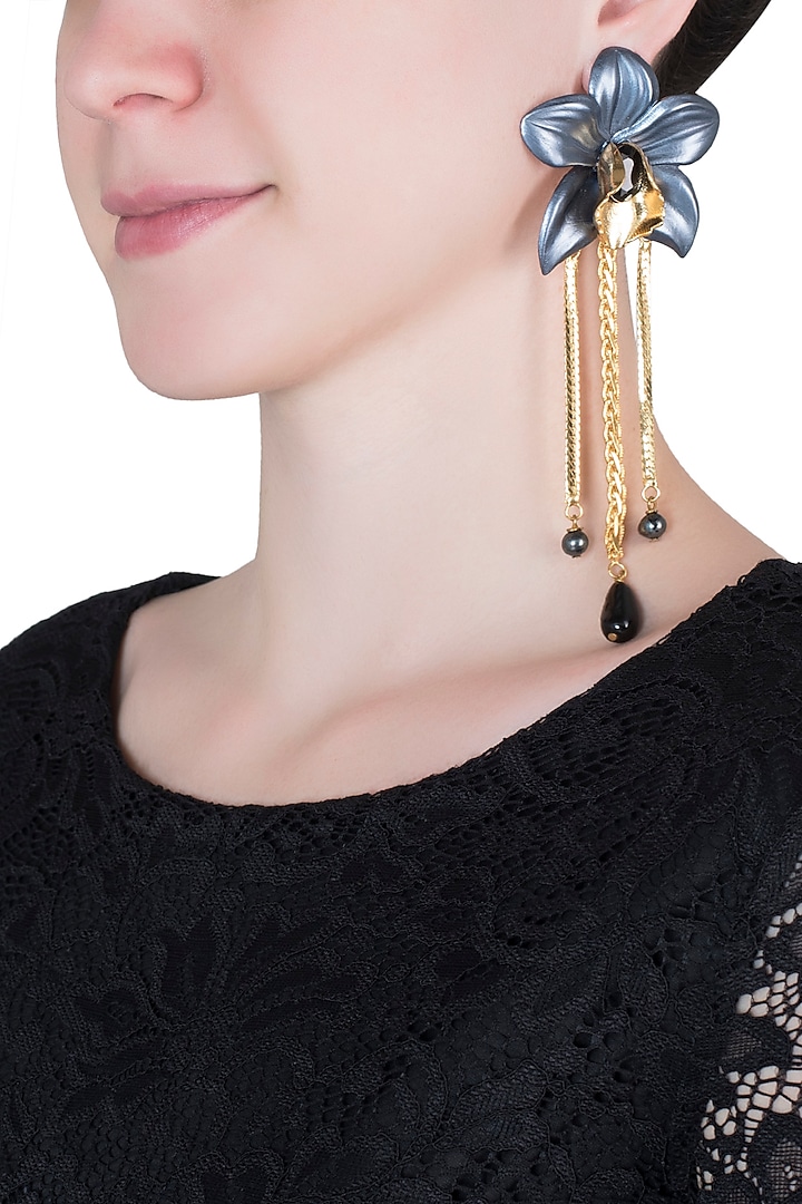 Gold plated grey orchid earrings by Valliyan by Nitya Arora