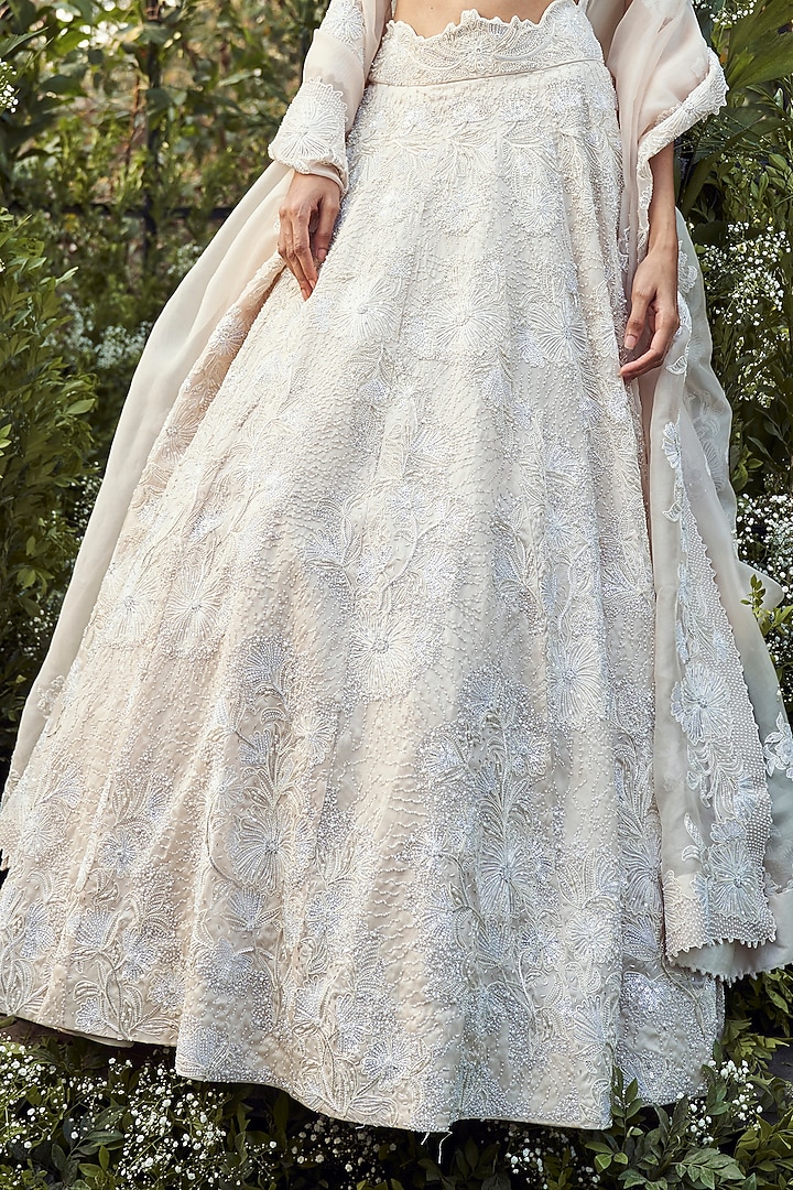 Alabaster White Organza 3D Floral Embroidered Bridal Lehenga Set by Varun Chakkilam at Pernia's Pop Up Shop