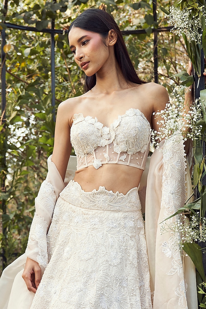 Alabaster White Organza 3D Floral Embroidered Bridal Lehenga Set by Varun Chakkilam at Pernia's Pop Up Shop