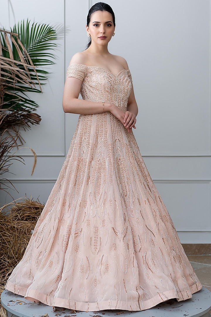 Peach Embroidered Off Shoulder Gown by Varun Chakkilam