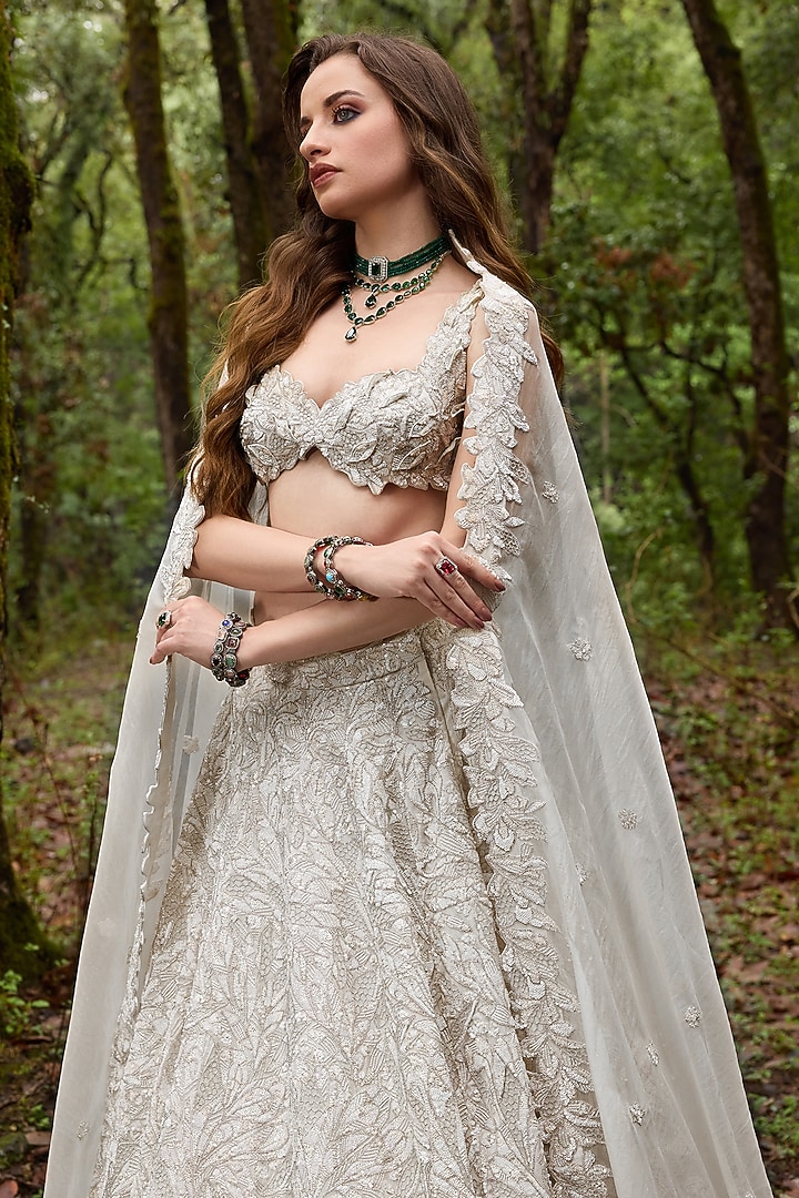 Alabaster White Organza Sequins Embroidered Bridal Lehenga Set by Varun Chakkilam at Pernia's Pop Up Shop