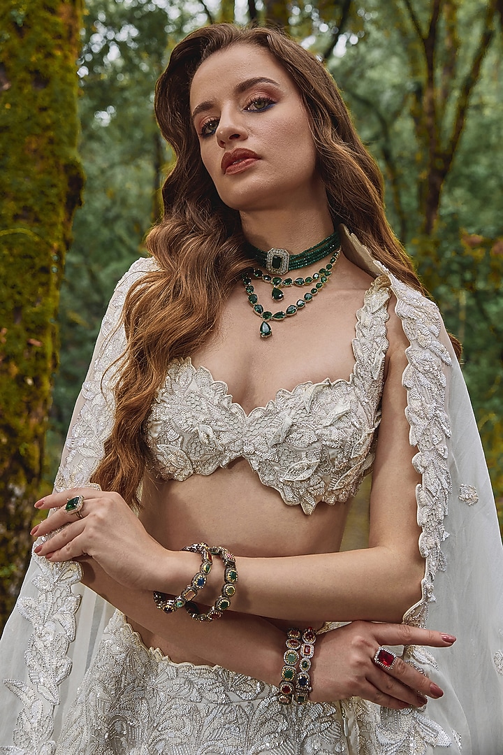 Alabaster White Organza Sequins Embroidered Bridal Lehenga Set by Varun Chakkilam at Pernia's Pop Up Shop