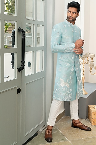 Blue Raw Silk Motif Embellished Sherwani Set by Varun Chakkilam Men