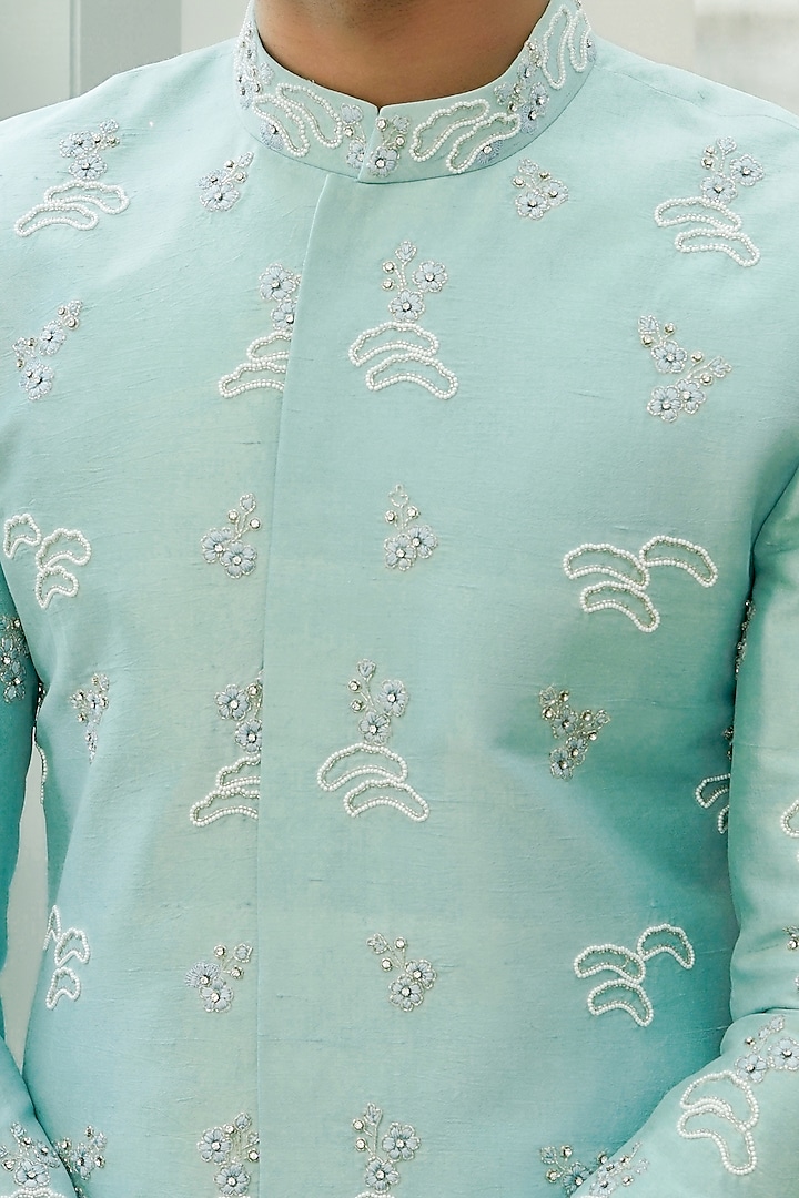 Blue Raw Silk Motif Embellished Wedding Sherwani Set by Varun Chakkilam Men at Pernia's Pop Up Shop