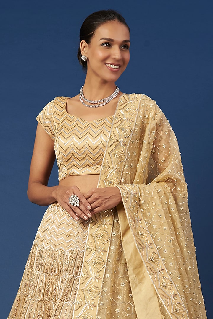 Beige Embroidered Bridal Lehenga Set by Varun Chakkilam at Pernia's Pop Up Shop
