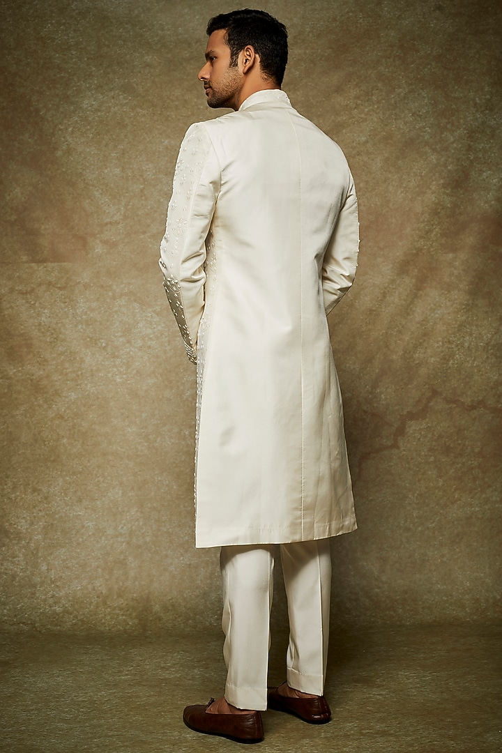 Ivory Silk Embroidered Groom Sherwani Set by Varun Chakkilam Men at Pernia's Pop Up Shop