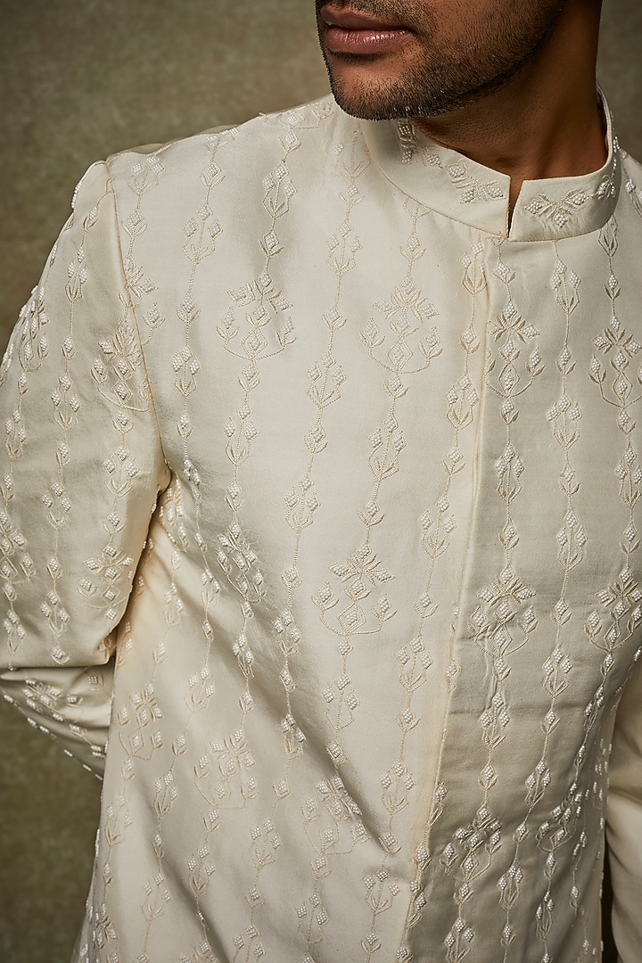 Ivory Silk Embroidered Groom Sherwani Set by Varun Chakkilam Men at Pernia's Pop Up Shop