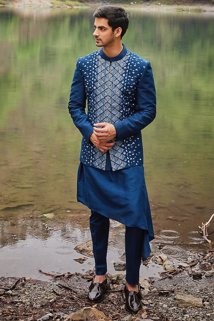 Midnight Blue Raw Silk & Satin Lycra Thread Embroidered Indowestern Jacket Set by Varun Chakkilam Men