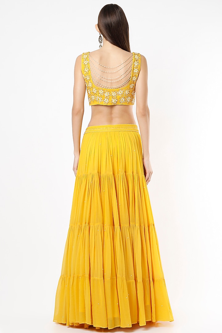 Mango Yellow Tiered Wedding Lehenga Set by VIDHI AGRAWAL at Pernia's Pop Up Shop