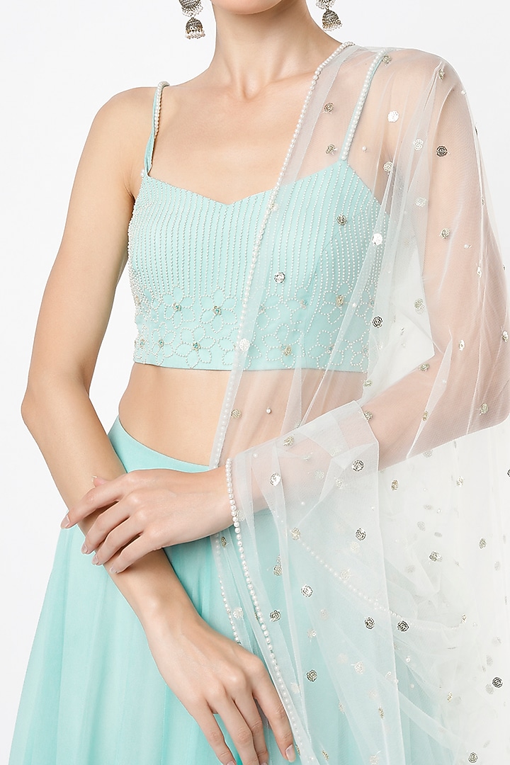 Aqua Gathered Lehenga Set by VIDHI AGRAWAL at Pernia's Pop Up Shop