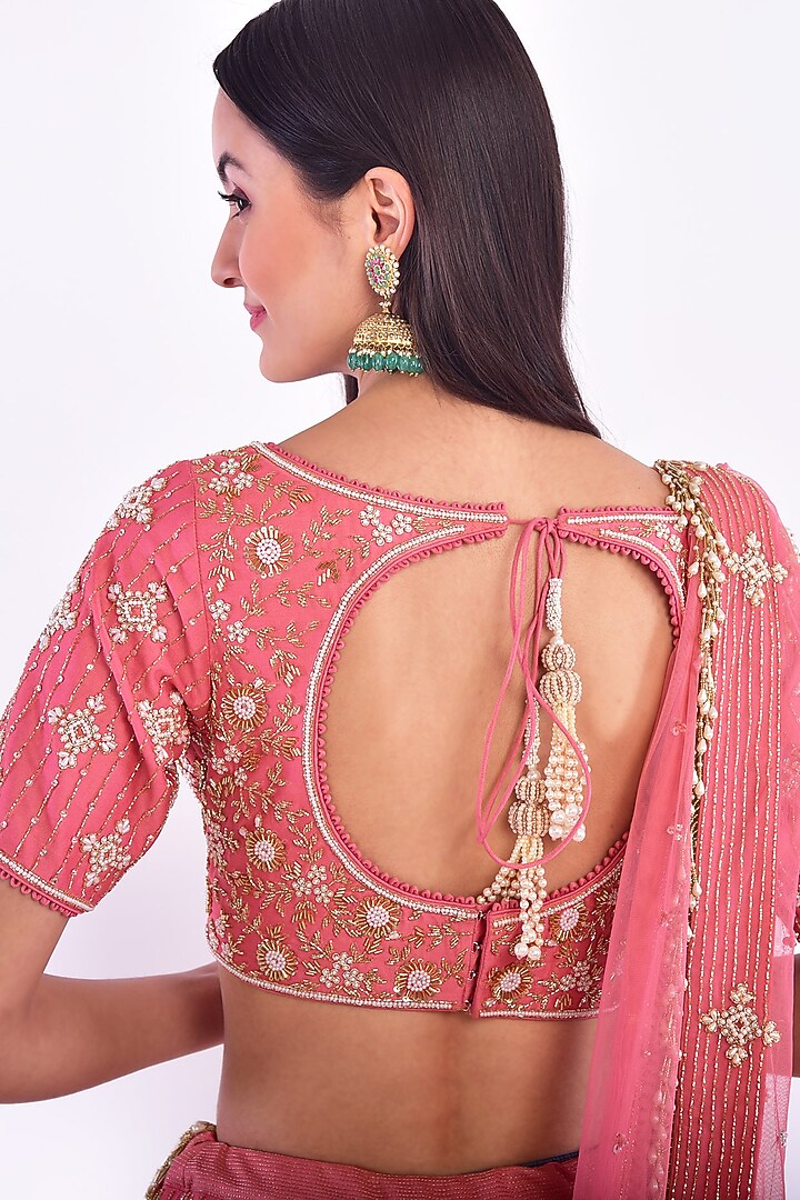 Coral Pink Hand Embroidered Wedding Lehenga Set by Vidushi Gupta at Pernia's Pop Up Shop