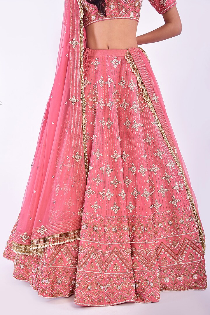 Coral Pink Hand Embroidered Wedding Lehenga Set by Vidushi Gupta at Pernia's Pop Up Shop