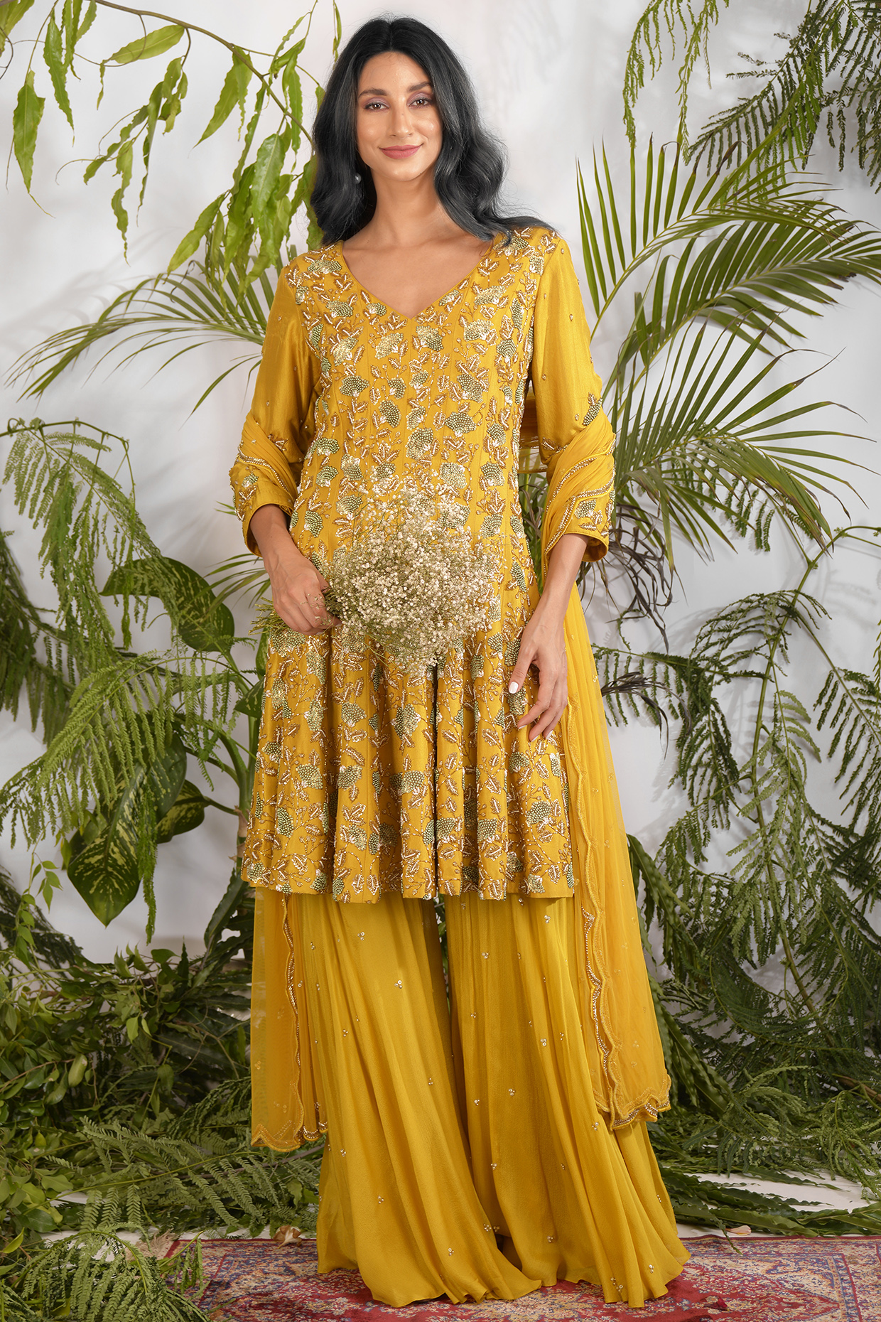 Mustard Hand Embroidered Peplum Kurta Set by Vidushi Gupta at Pernia's Pop Up Shop