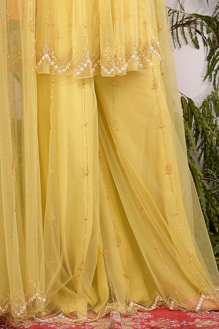 Lime Yellow Hand Embroidered Peplum Kurta Set by Vidushi Gupta at Pernia's Pop Up Shop