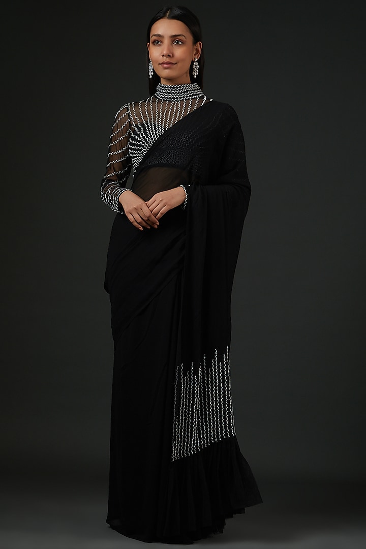 black Pre-stitched embroidered saree
 by Vedika Soni