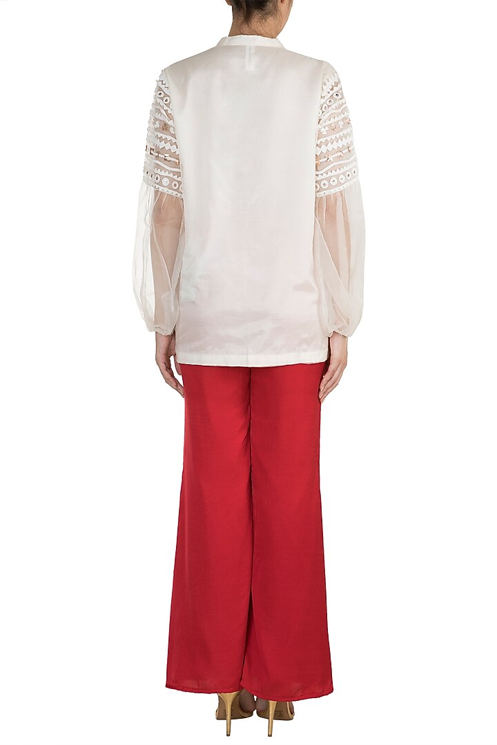Red Flared Pants by Vidhi Wadhwani at Pernia's Pop Up Shop