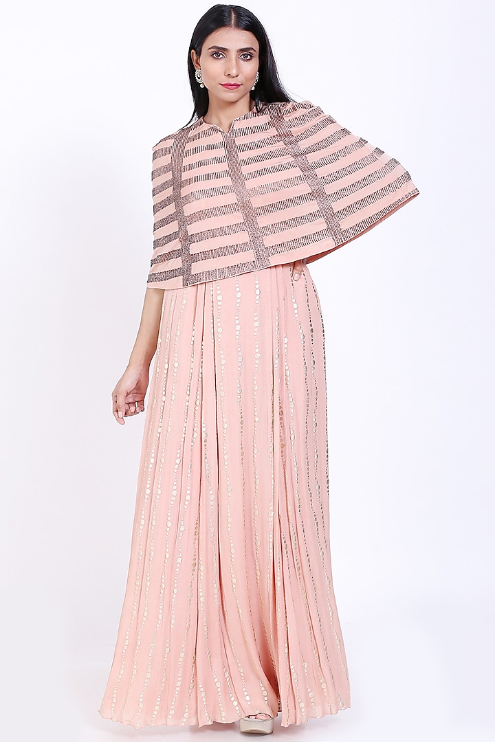 Peach Pink Foil Printed Gown With Cape by Vedangi Agarwal