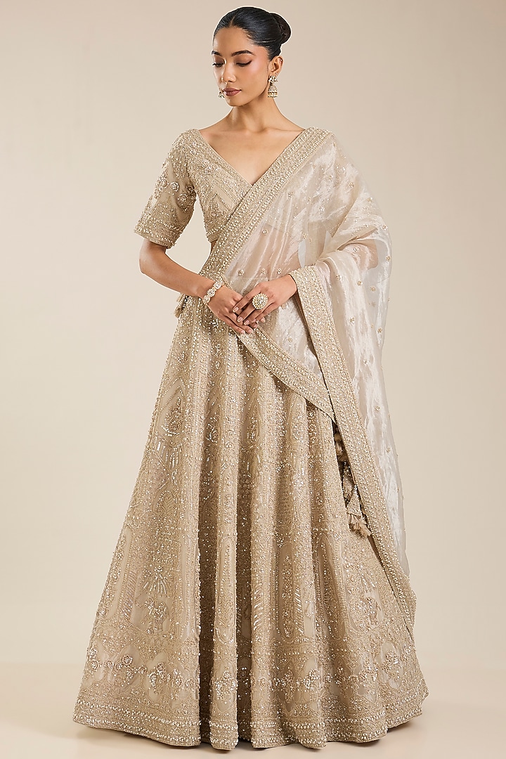 Champagne Tissue Sequins Embroidered Bridal Lehenga Set by Vedant G at Pernia's Pop Up Shop