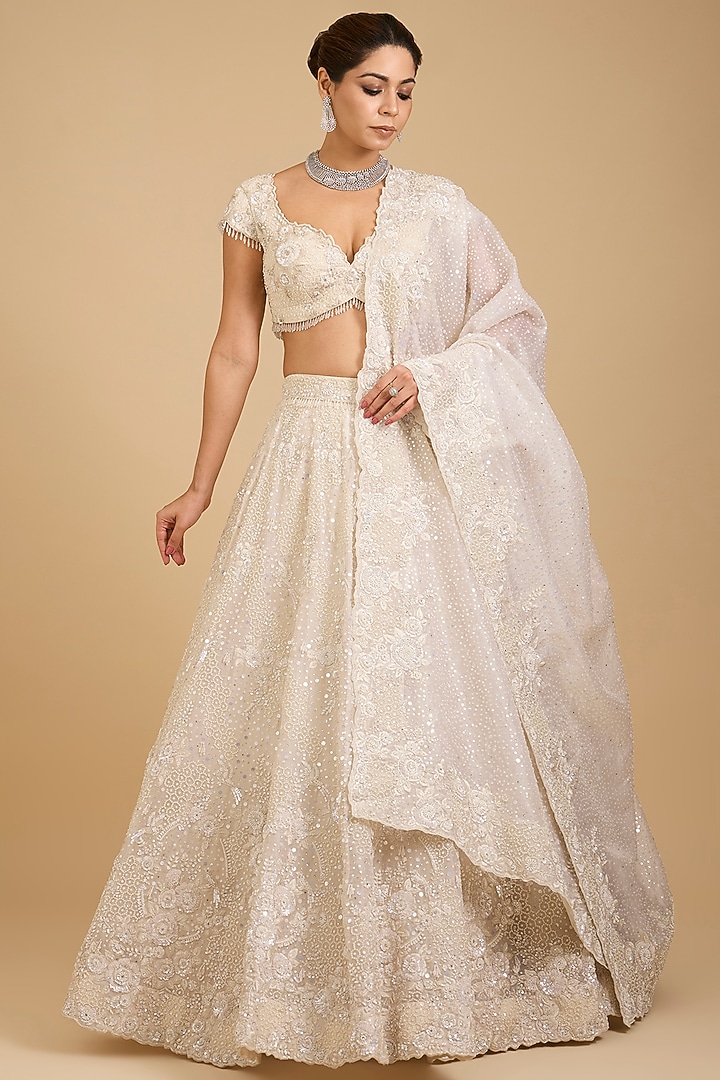 Ivory Organza Sequins Embroidered Bridal Lehenga Set by Vedant G at Pernia's Pop Up Shop