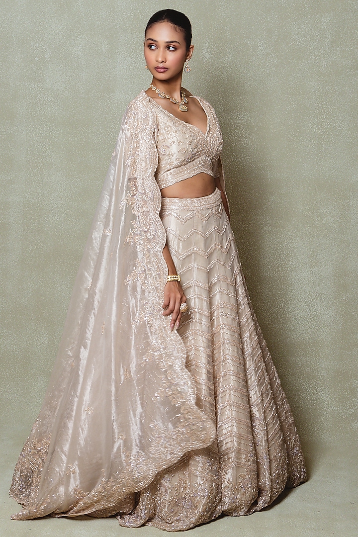 Champagne Tissue Sequins Embroidered Bridal Lehenga Set by Vedant G at Pernia's Pop Up Shop