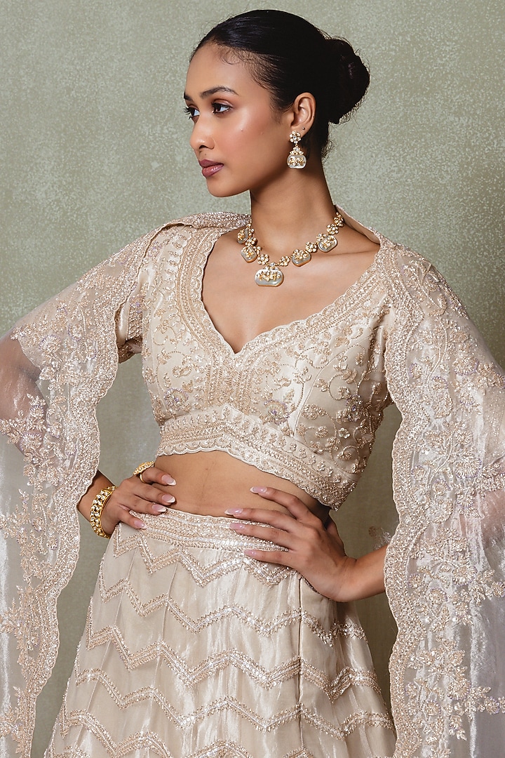 Champagne Tissue Sequins Embroidered Bridal Lehenga Set by Vedant G at Pernia's Pop Up Shop