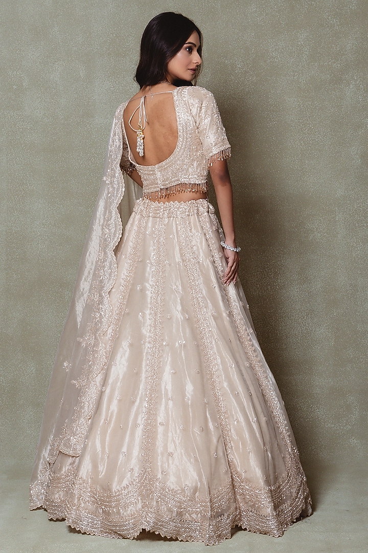 Champagne Tissue Sequins Embroidered Wedding Lehenga Set by Vedant G at Pernia's Pop Up Shop