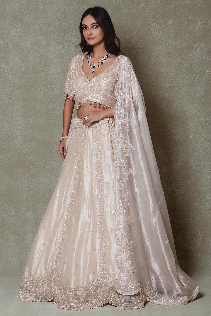 Champagne Tissue Sequins Embroidered Wedding Lehenga Set by Vedant G at Pernia's Pop Up Shop