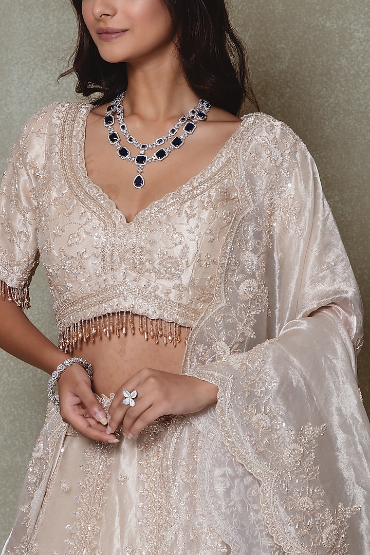 Champagne Tissue Sequins Embroidered Wedding Lehenga Set by Vedant G at Pernia's Pop Up Shop