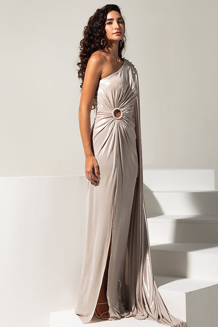 Champagne Metallic Lycra Embellished One-Shoulder Party Wear Gown by Vesture at Pernia's Pop Up Shop