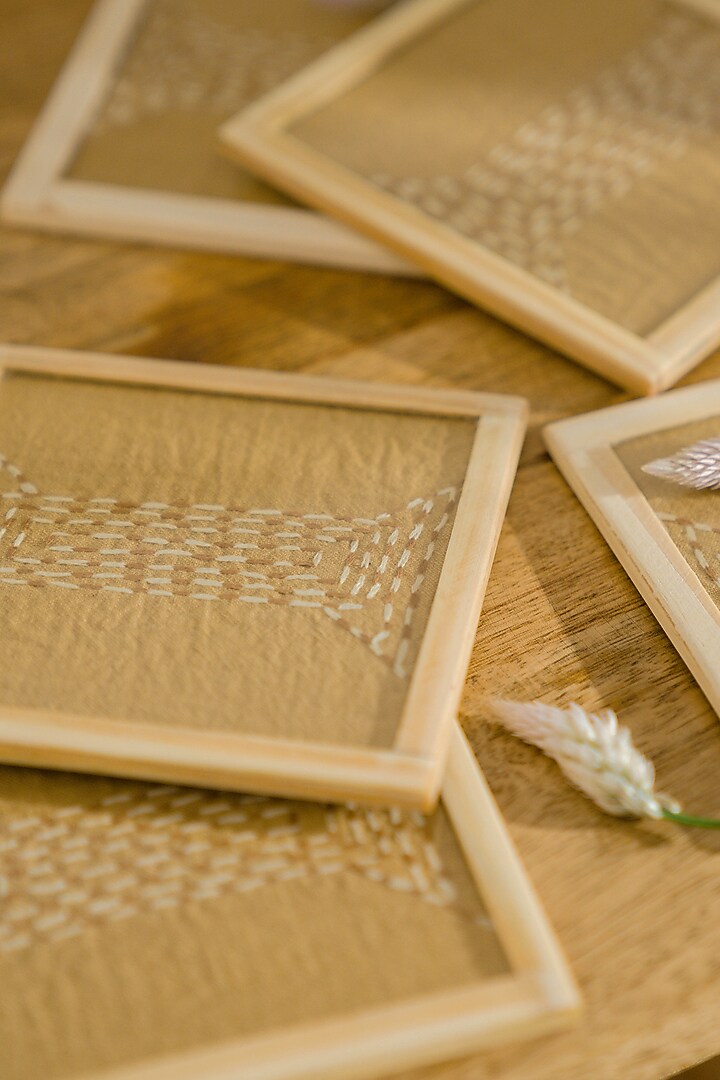 Beige Pure Handwoven Cotton Hand Embroidered Coasters (Set of 2) by Veaves at Pernia's Pop Up Shop