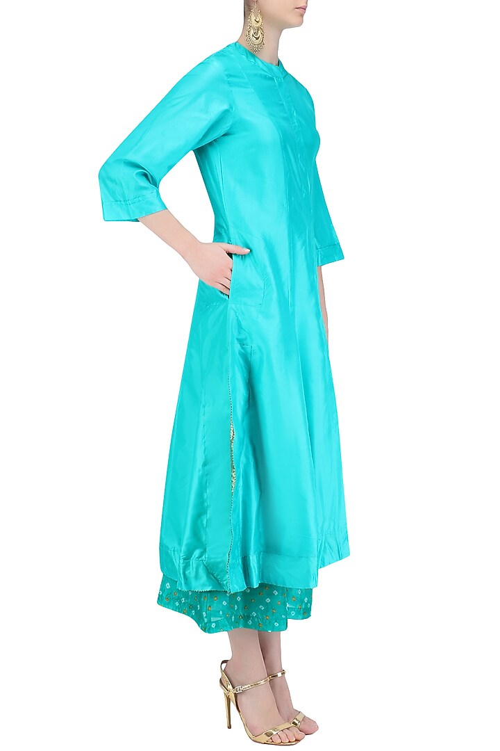 Turquoise 'A' line pita work cycle embroidery kurta with bandhini palazzos available only at Pernia's Pop Up Shop.