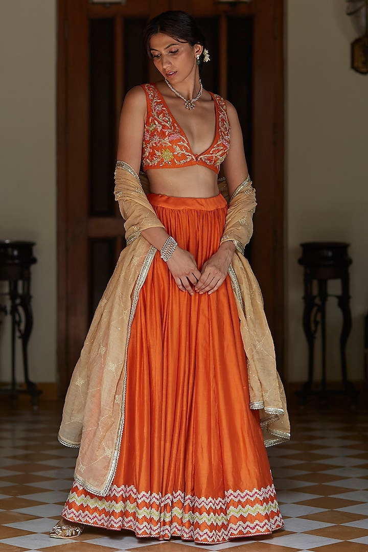 Orange Embroidered Lehenga Set by Vashisht Guru Dutt