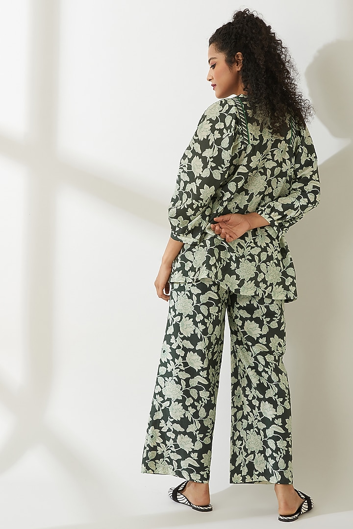 Green Floral Printed Trousers by VIAM at Pernia's Pop Up Shop