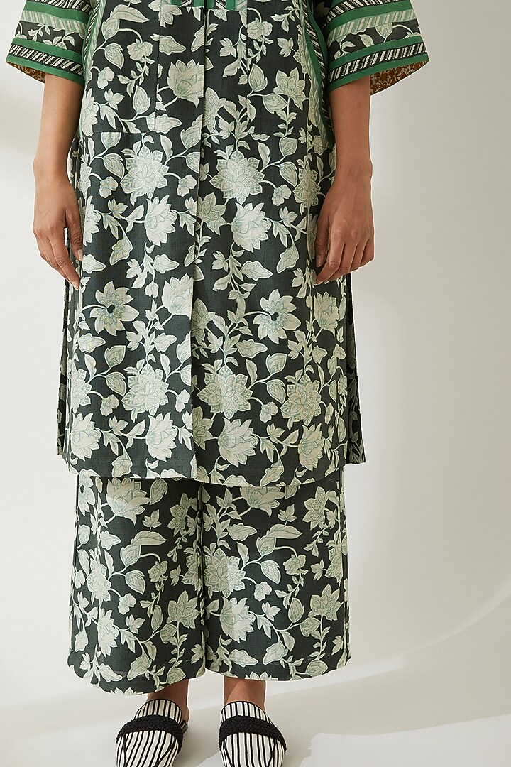 Green Trousers With Print by VIAM at Pernia's Pop Up Shop