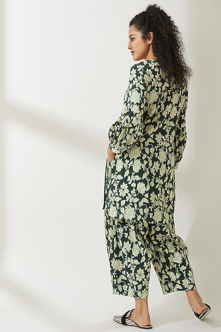 Green Floral Printed Trousers by VIAM at Pernia's Pop Up Shop